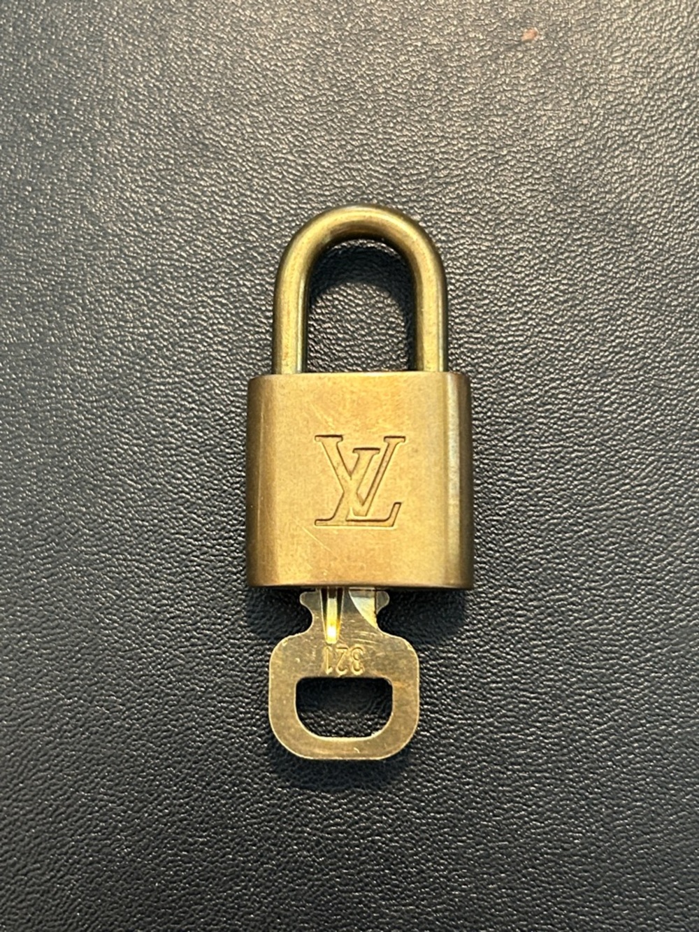 Louis Vuitton Gold Padlock and Key Set
